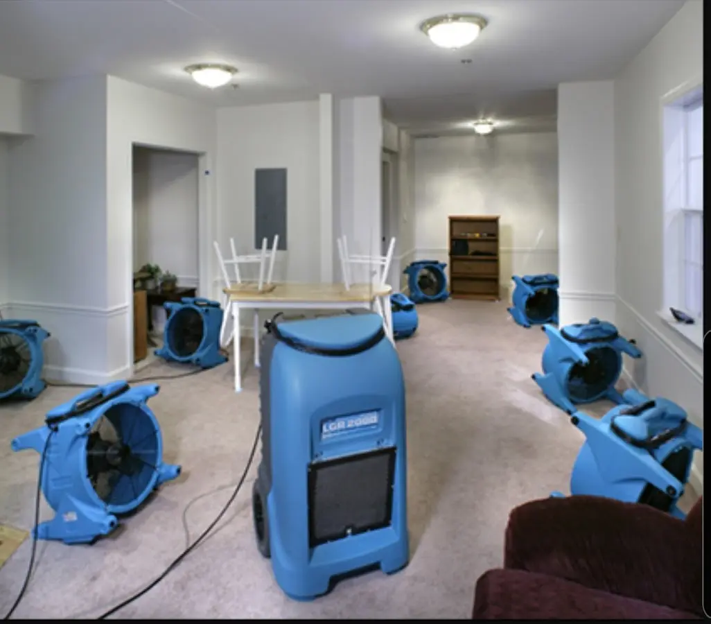 Air movers and dehumidifier setup for Water Extraction & Removal in Neosho